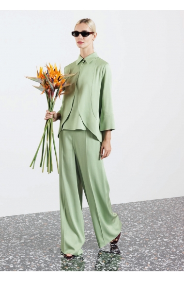 Diana Gallesi faded green shirt