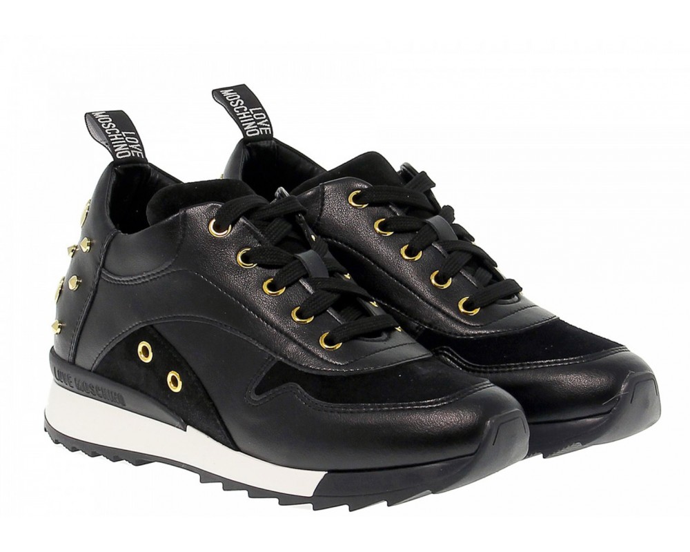 black trainers with studs